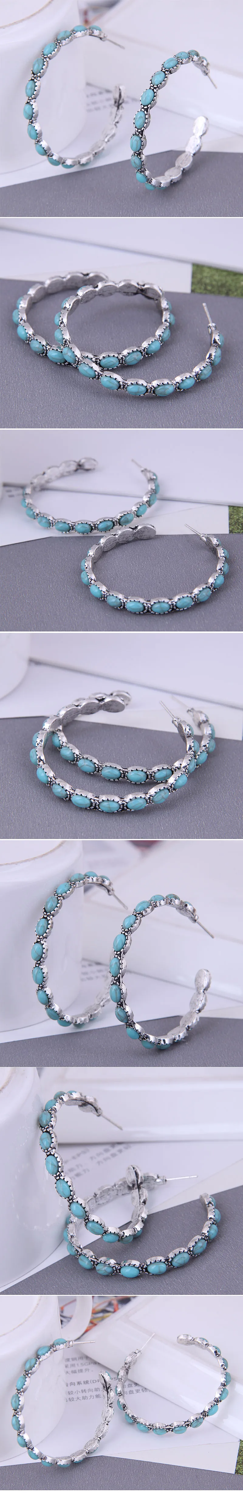 Fashion Metal Simple Inlaid Turquoise Exaggerated Alloy Earrings display picture 1