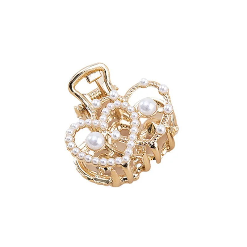 Women's Simple Style Heart Shape Metal Plating Inlay Artificial Pearls Rhinestones Hair Claws display picture 1