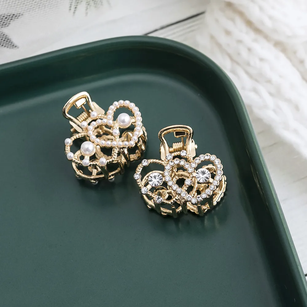 Women's Simple Style Heart Shape Metal Plating Inlay Artificial Pearls Rhinestones Hair Claws display picture 3