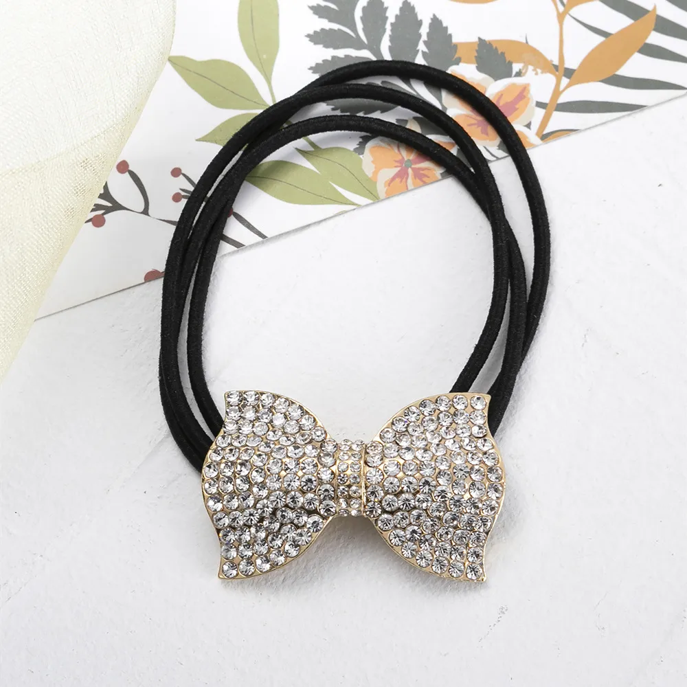Women's Sweet Bow Knot Rhinestone Plating Inlay Artificial Pearls Hair Tie display picture 6