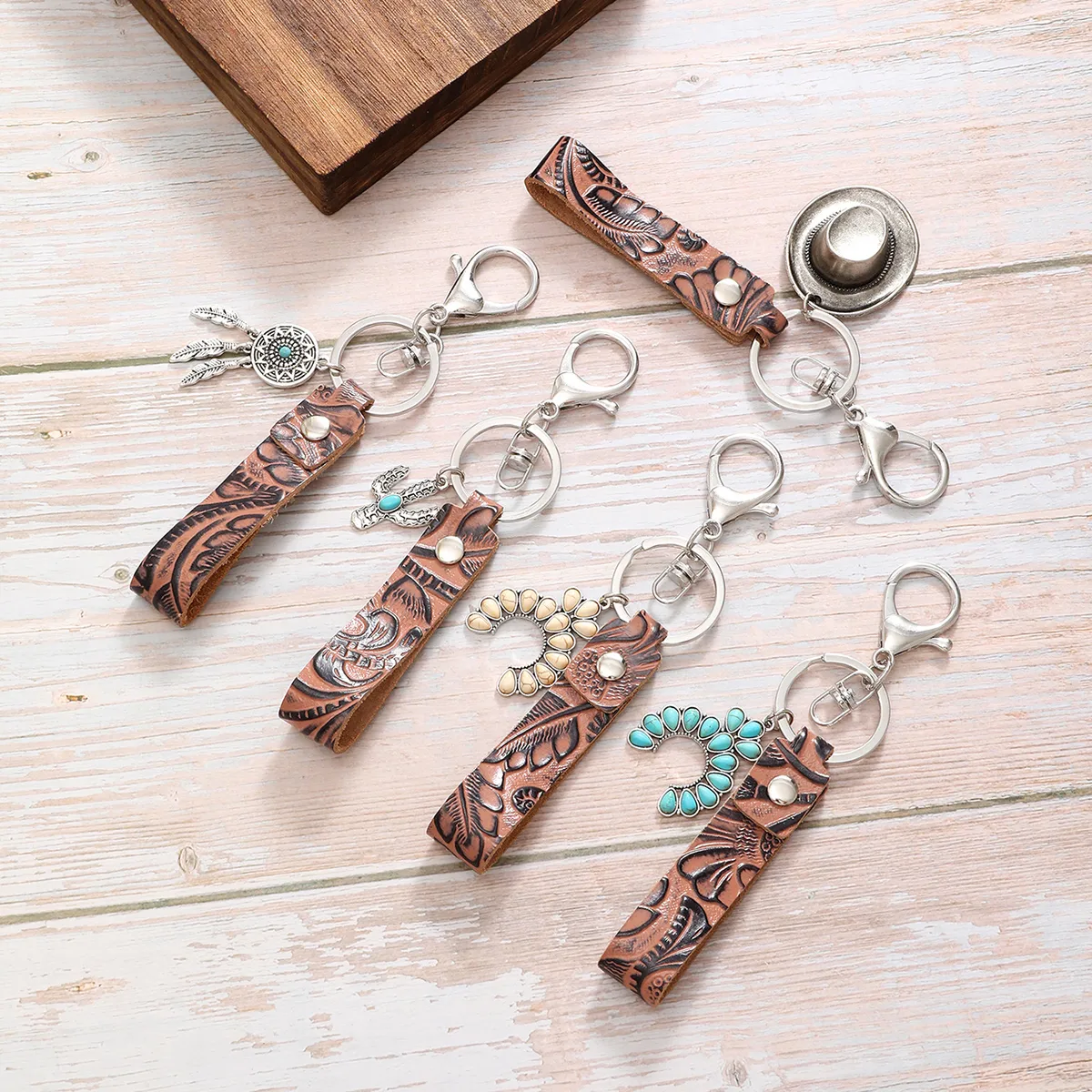 Simple Style Cactus Leaf Dreamcatcher Pu Leather Alloy Turquoise Bag Pendant Keychain display picture 1