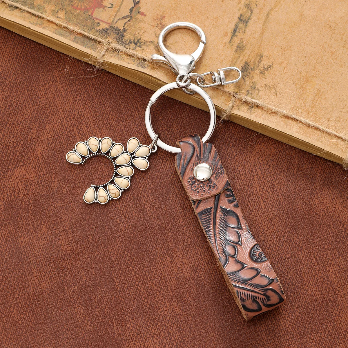 Simple Style Cactus Leaf Dreamcatcher Pu Leather Alloy Turquoise Bag Pendant Keychain display picture 3