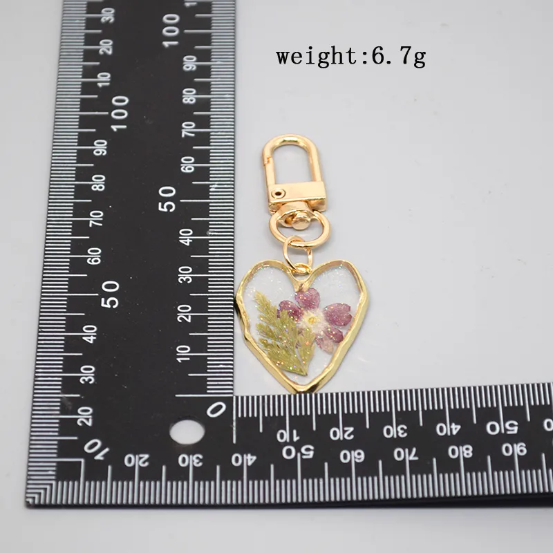Simple Style Heart Shape Resin Keychain display picture 1