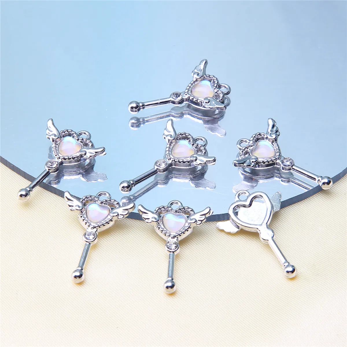 10 PCS/Package 12*17 * 4mm 18*15 * 4mm 19*10 * 6mm Alloy Artificial Pearls Heart Shape Wings Pendant display picture 4