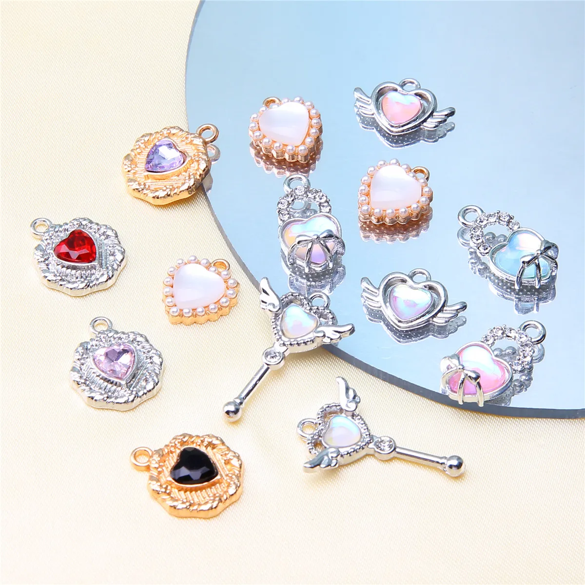 10 PCS/Package 12*17 * 4mm 18*15 * 4mm 19*10 * 6mm Alloy Artificial Pearls Heart Shape Wings Pendant display picture 7