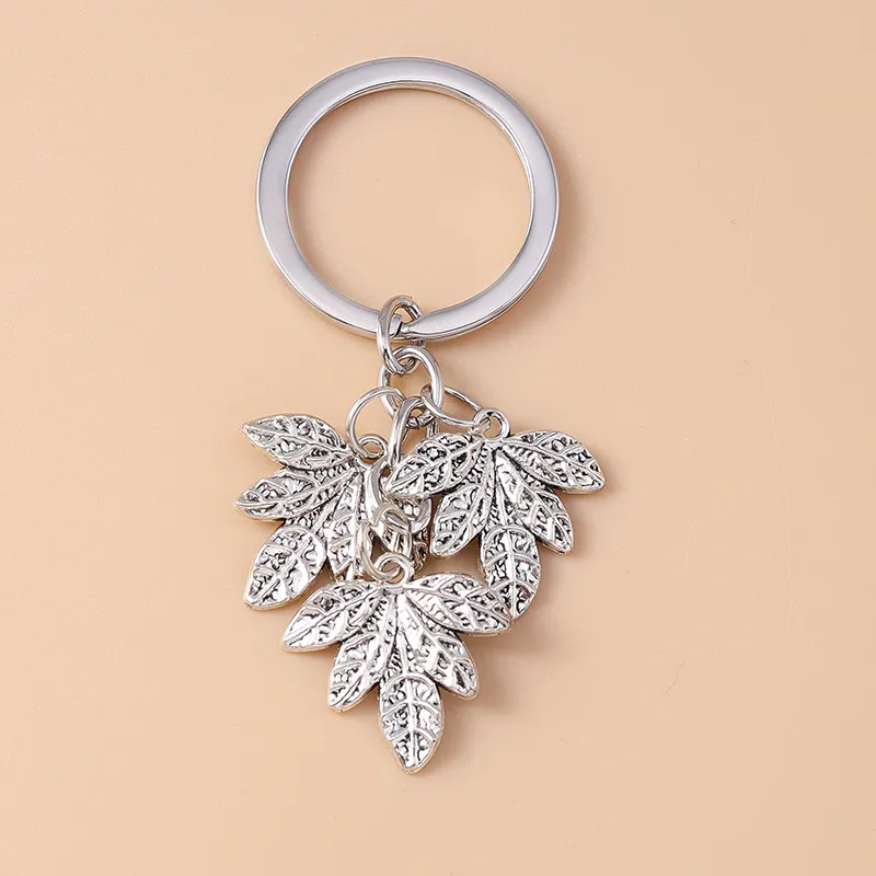 Cute Commute Leaf Butterfly Alloy Bag Pendant Keychain display picture 3