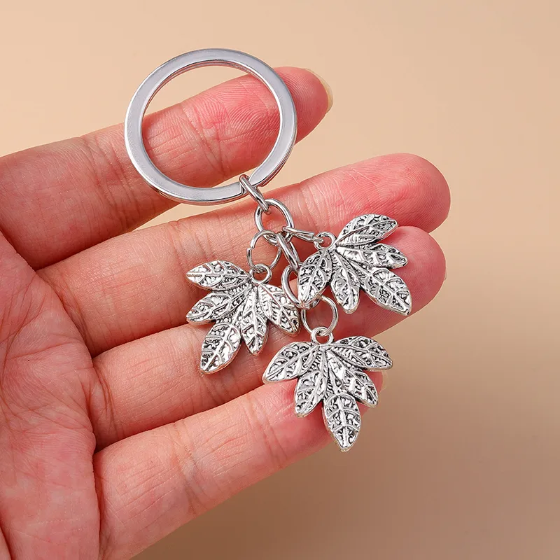 Cute Commute Leaf Butterfly Alloy Bag Pendant Keychain display picture 9