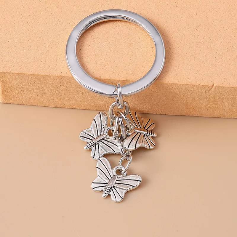 Cute Commute Leaf Butterfly Alloy Bag Pendant Keychain display picture 7