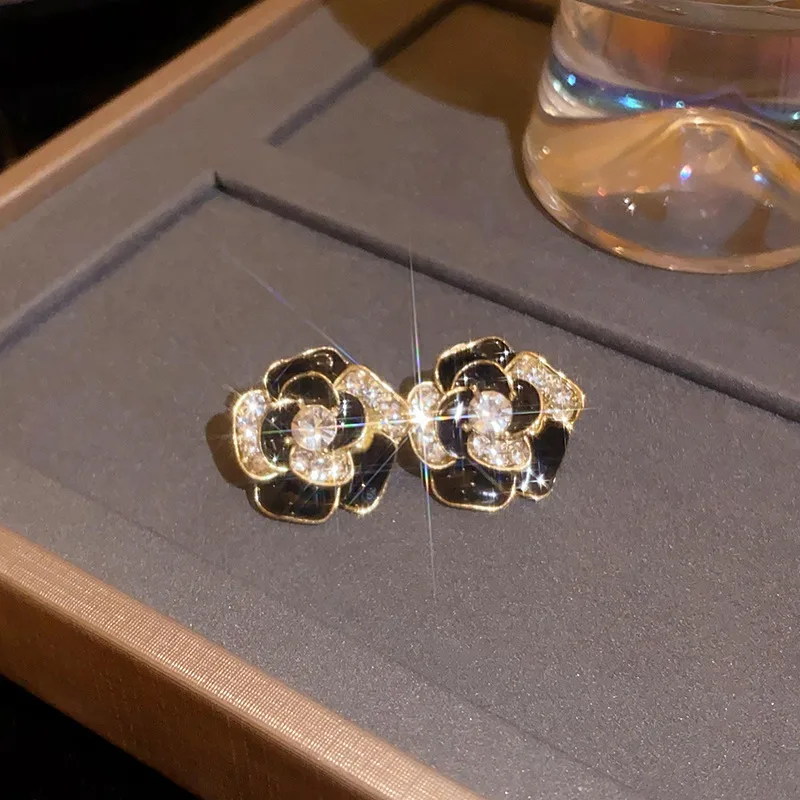 1 Pair Sweet Flower Inlay Alloy Zircon Ear Studs display picture 2