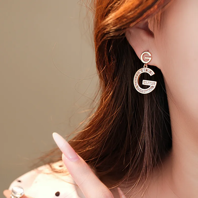 1 Pair Simple Style Classic Style Letter Inlay Copper Zircon Drop Earrings display picture 9