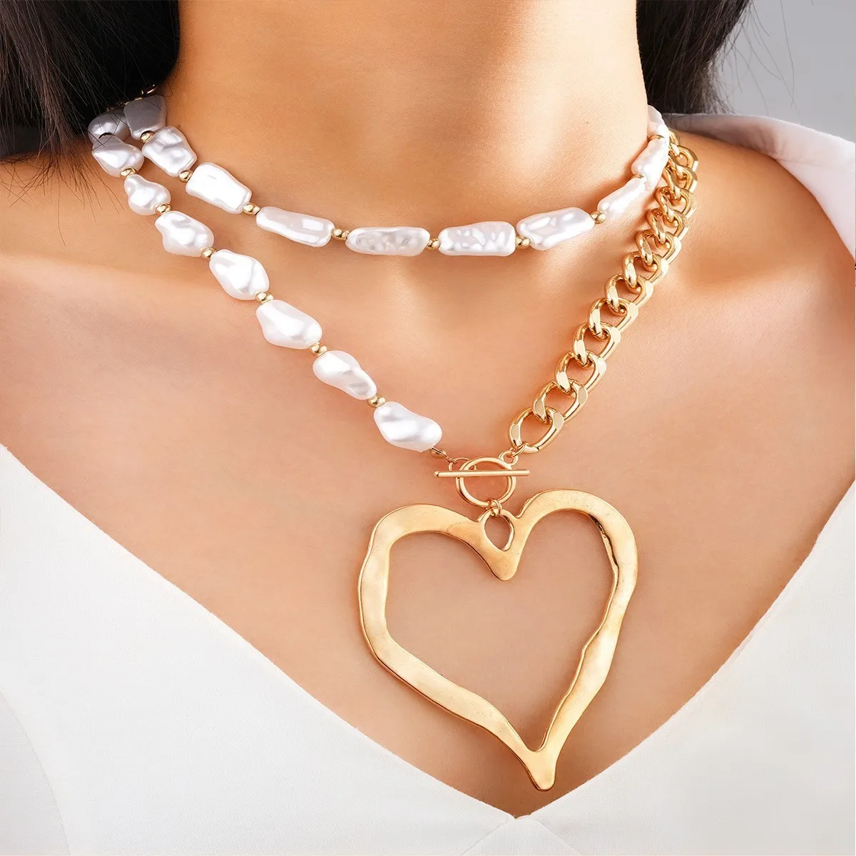 Exaggerated Heart Shape Imitation Pearl Alloy Beaded Chain Statement Necklaces Wholesale display picture 2