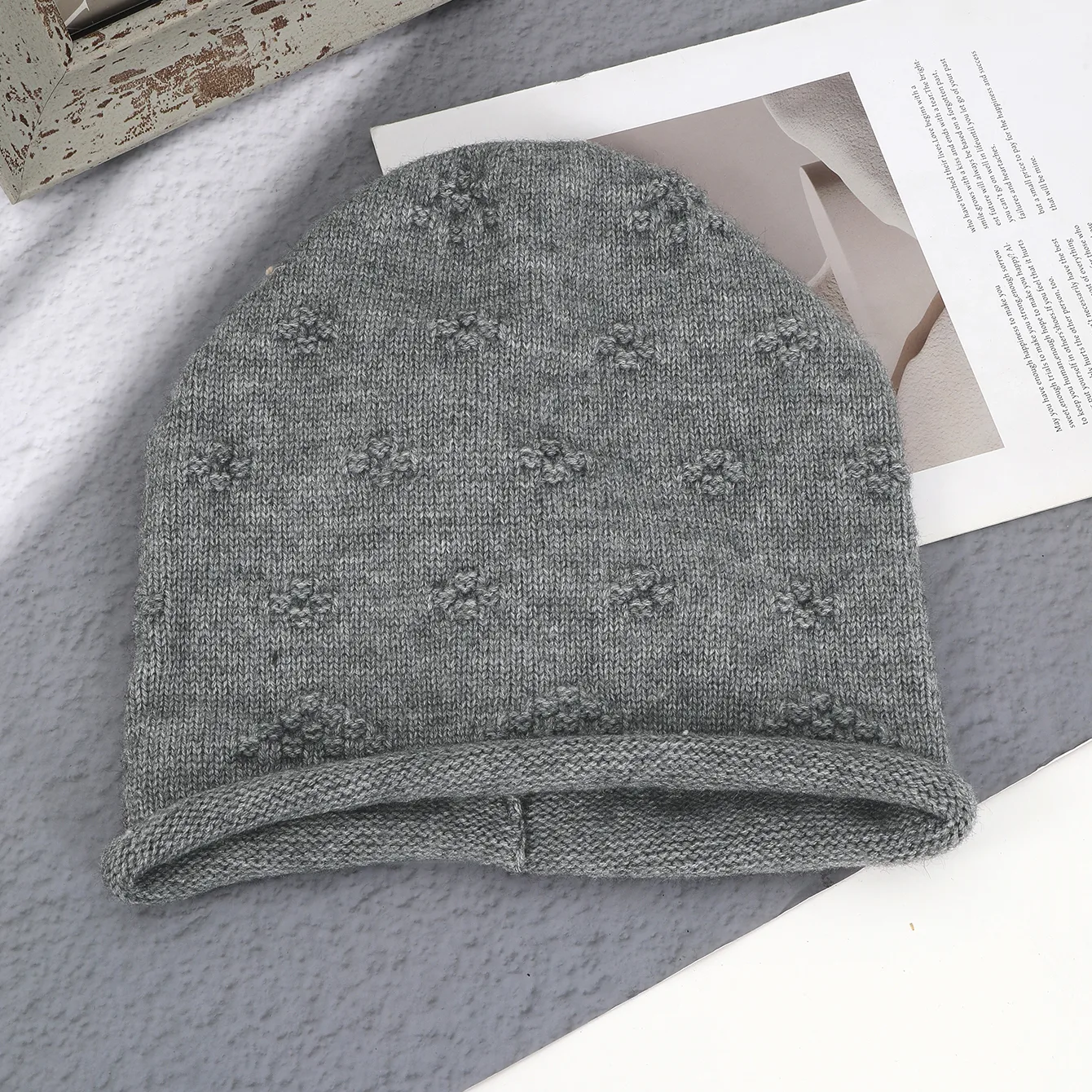 Women's Simple Style Solid Color Flower Drawstring Crimping Wool Cap display picture 7