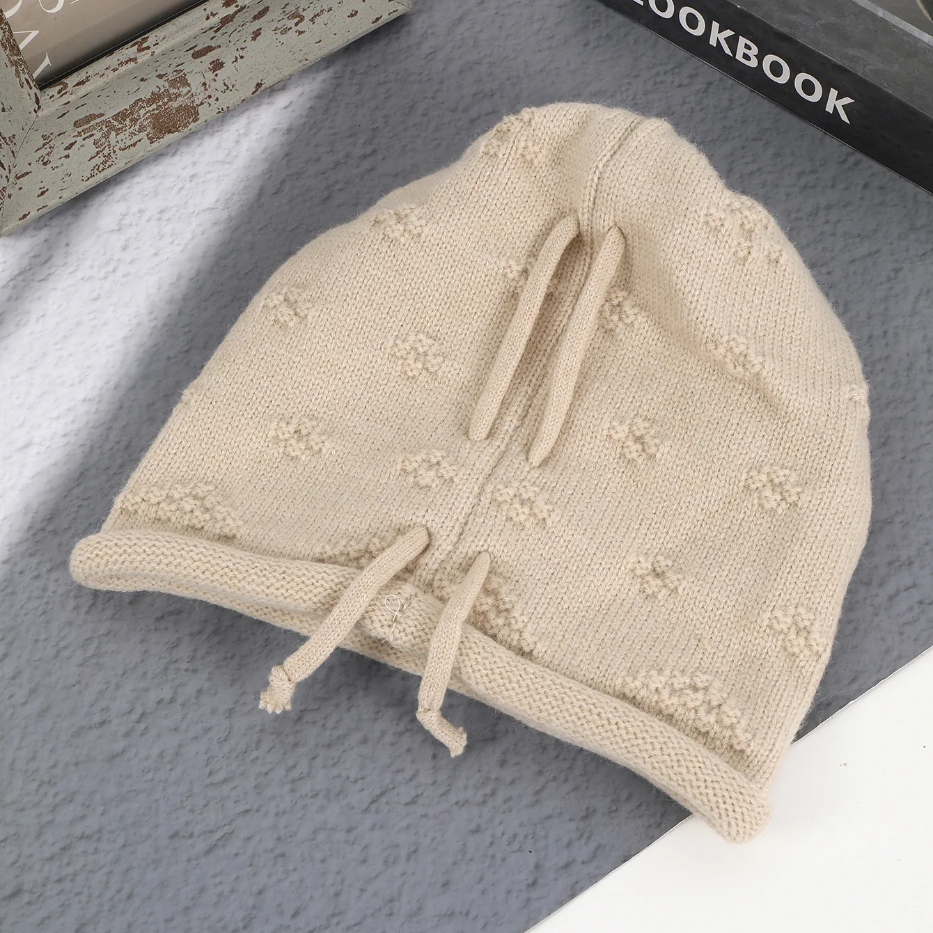 Women's Simple Style Solid Color Flower Drawstring Crimping Wool Cap display picture 11