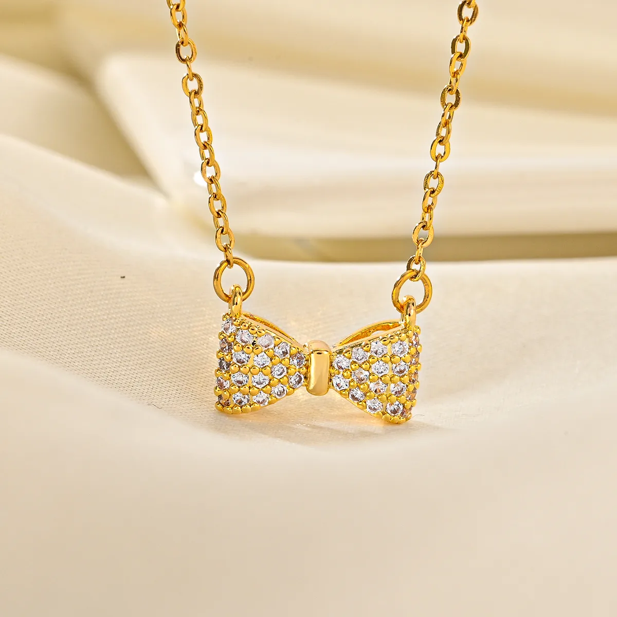 Titanium Steel Simple Style Classic Style Inlay Bow Knot Diamond Pendant Necklace display picture 2