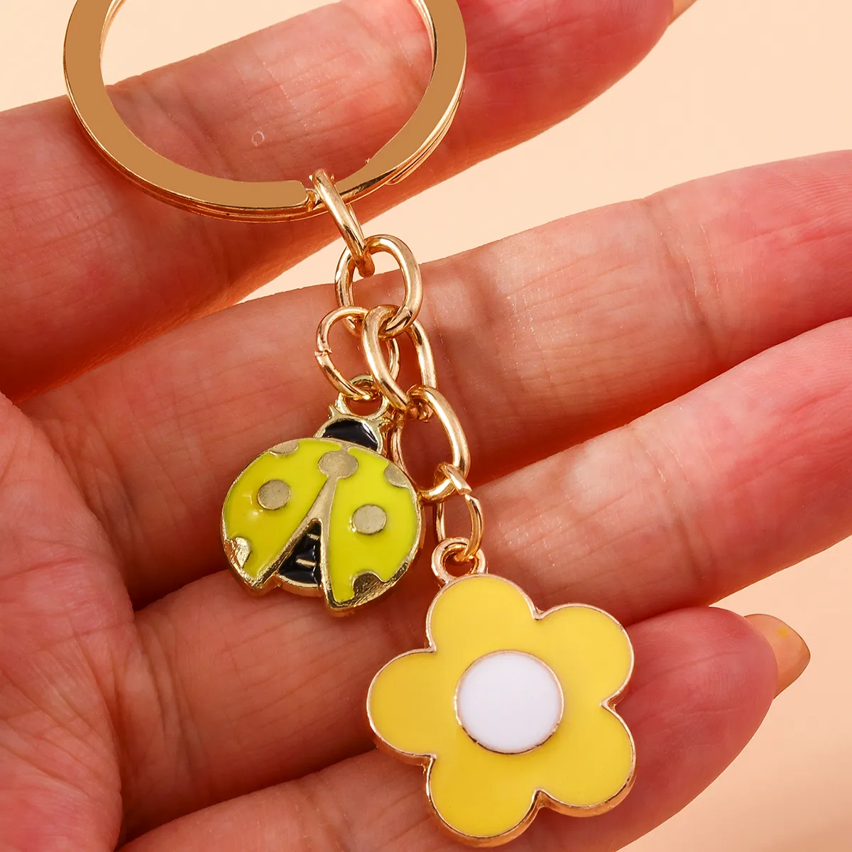 Pastoral Beetles Flower Alloy Keychain display picture 2