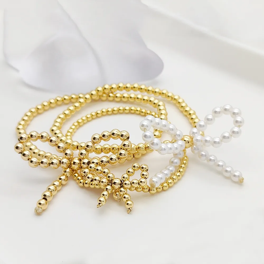 Simple Style Classic Style Bow Knot Imitation Pearl Copper Wholesale Bracelets display picture 8