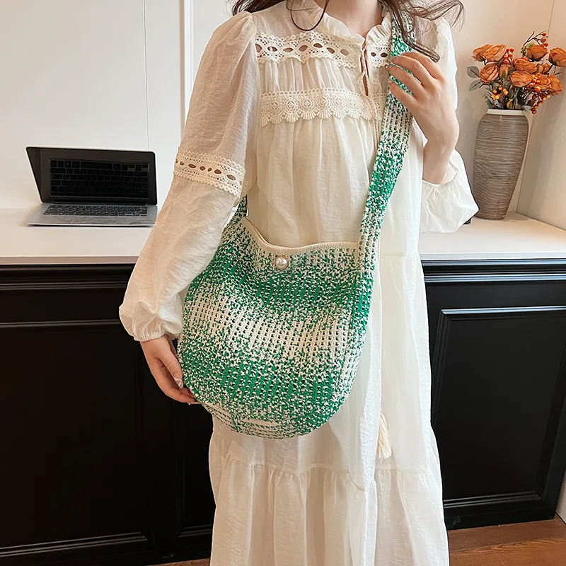 Women's Medium Straw Solid Color Vacation Classic Style Hollow Bucket Magnetic Buckle Crossbody Bag display picture 9