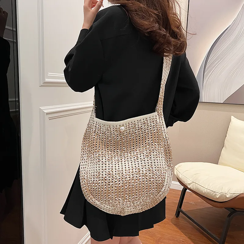 Women's Medium Straw Solid Color Vacation Classic Style Hollow Bucket Magnetic Buckle Crossbody Bag display picture 8