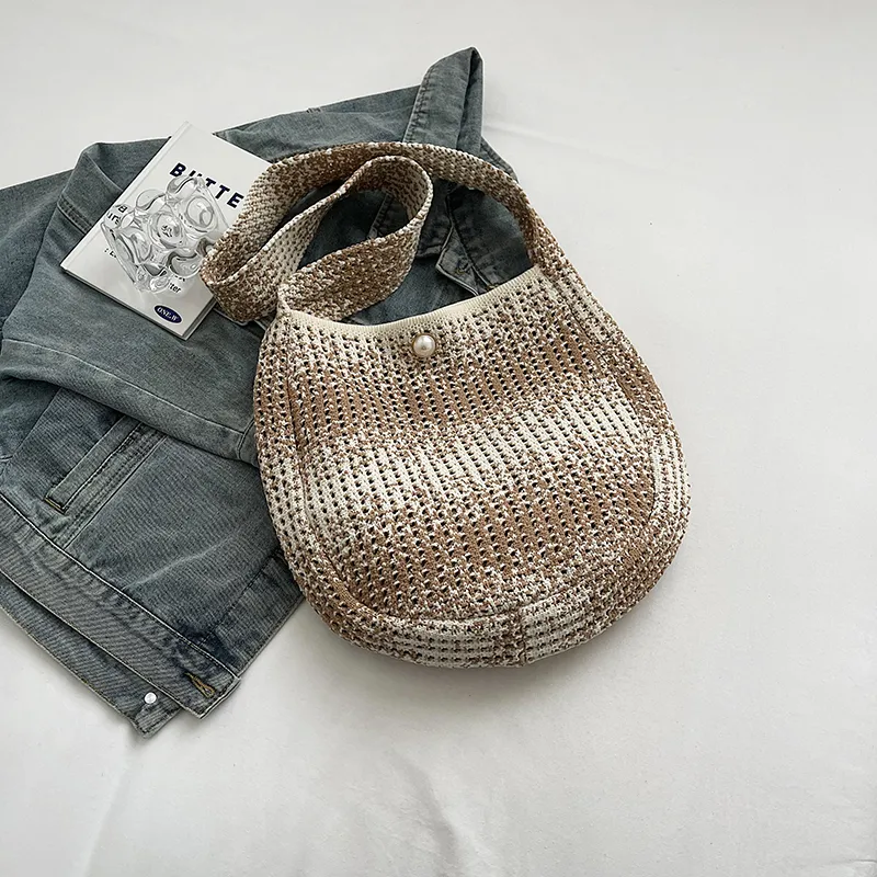 Women's Medium Straw Solid Color Vacation Classic Style Hollow Bucket Magnetic Buckle Crossbody Bag display picture 11