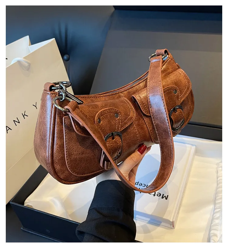 Wholesale Sweet Cool Motorcycle Bag For Women  New Niche Fashion Shoulder Underarm Bag Small Red Book  Women's Bag display picture 1