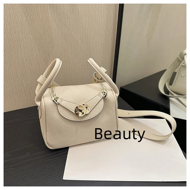 Retro Western Style Children's Bag  New PU Litchi Pattern Mini Portable Crossbody Shoulder Small Square Bag Trendy display picture 14