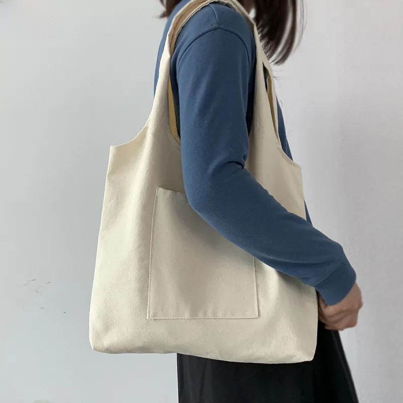 Pure Color Blank Hand-painted Canvas Bag Female Single Shoulder Japanese Simple Artistic Travel Large Capacity Student Class Book Bag display picture 7