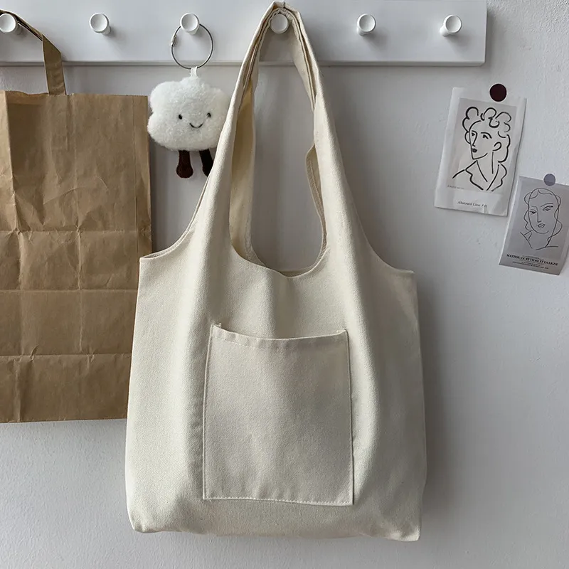 Pure Color Blank Hand-painted Canvas Bag Female Single Shoulder Japanese Simple Artistic Travel Large Capacity Student Class Book Bag display picture 9