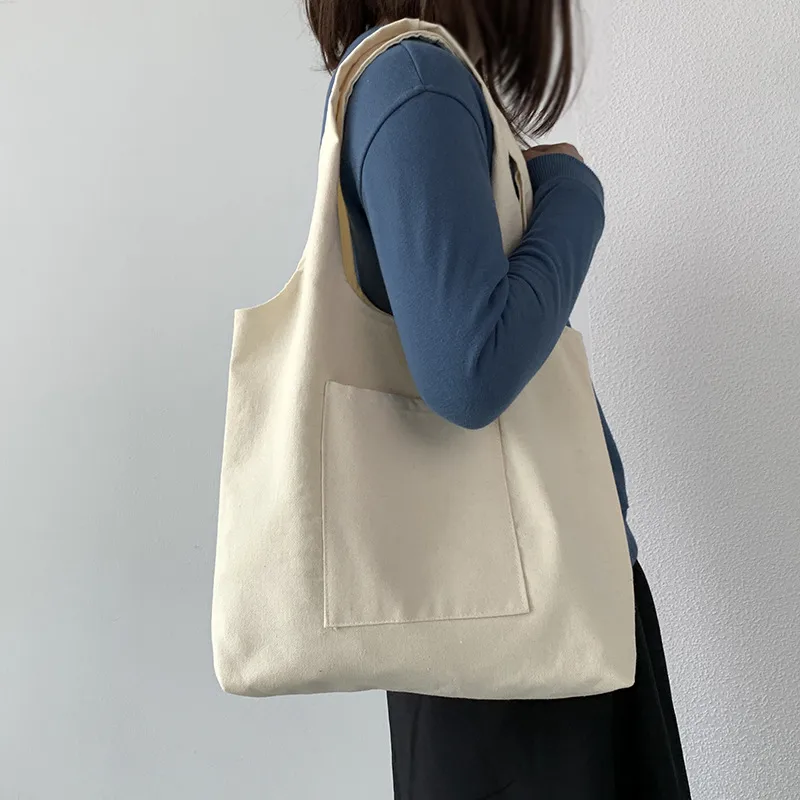 Pure Color Blank Hand-painted Canvas Bag Female Single Shoulder Japanese Simple Artistic Travel Large Capacity Student Class Book Bag display picture 11