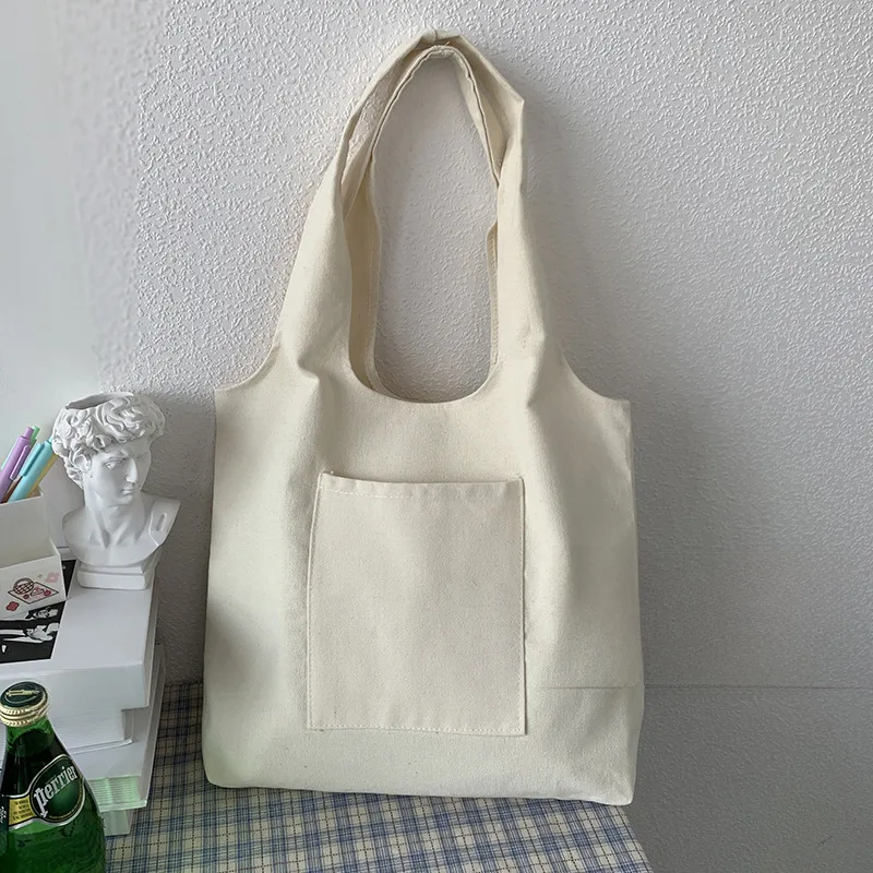 Pure Color Blank Hand-painted Canvas Bag Female Single Shoulder Japanese Simple Artistic Travel Large Capacity Student Class Book Bag display picture 16
