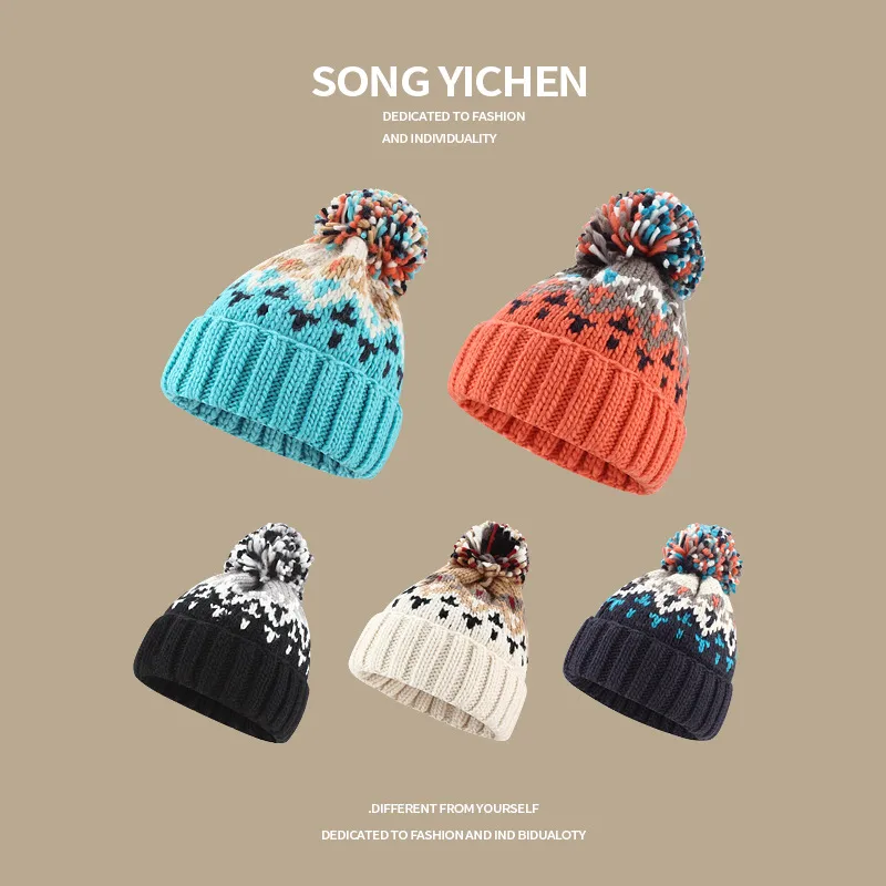 Warm Blue Knitted Hat Female  Fashion Brand Colorful Fur Ball Christmas Hat Autumn And Winter  Ear Protection Wool Hat display picture 2