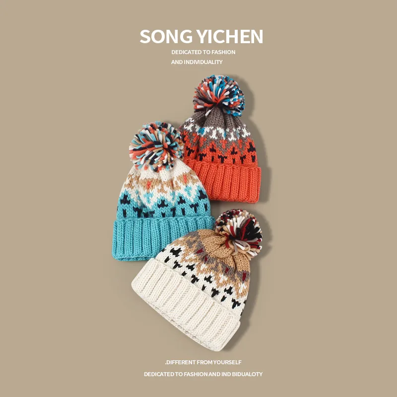 Warm Blue Knitted Hat Female  Fashion Brand Colorful Fur Ball Christmas Hat Autumn And Winter  Ear Protection Wool Hat display picture 3
