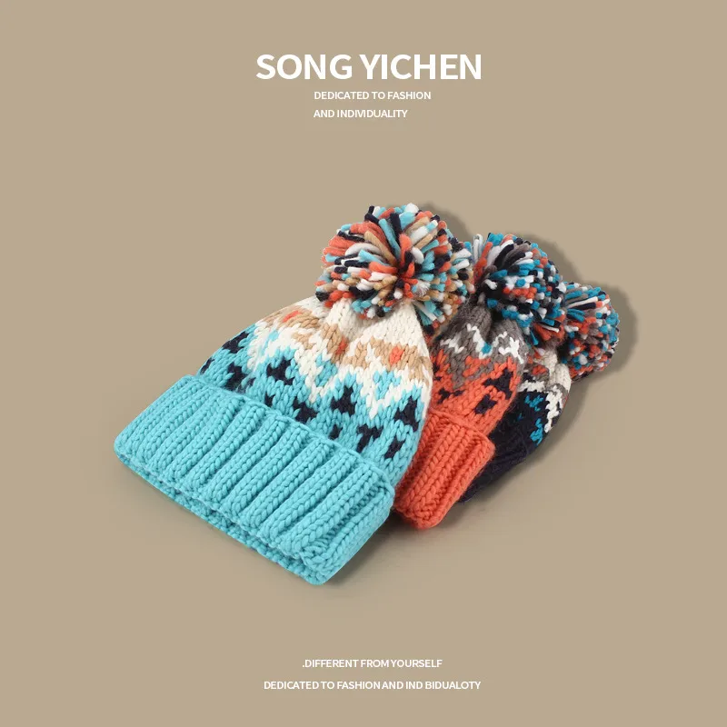 Warm Blue Knitted Hat Female  Fashion Brand Colorful Fur Ball Christmas Hat Autumn And Winter  Ear Protection Wool Hat display picture 4