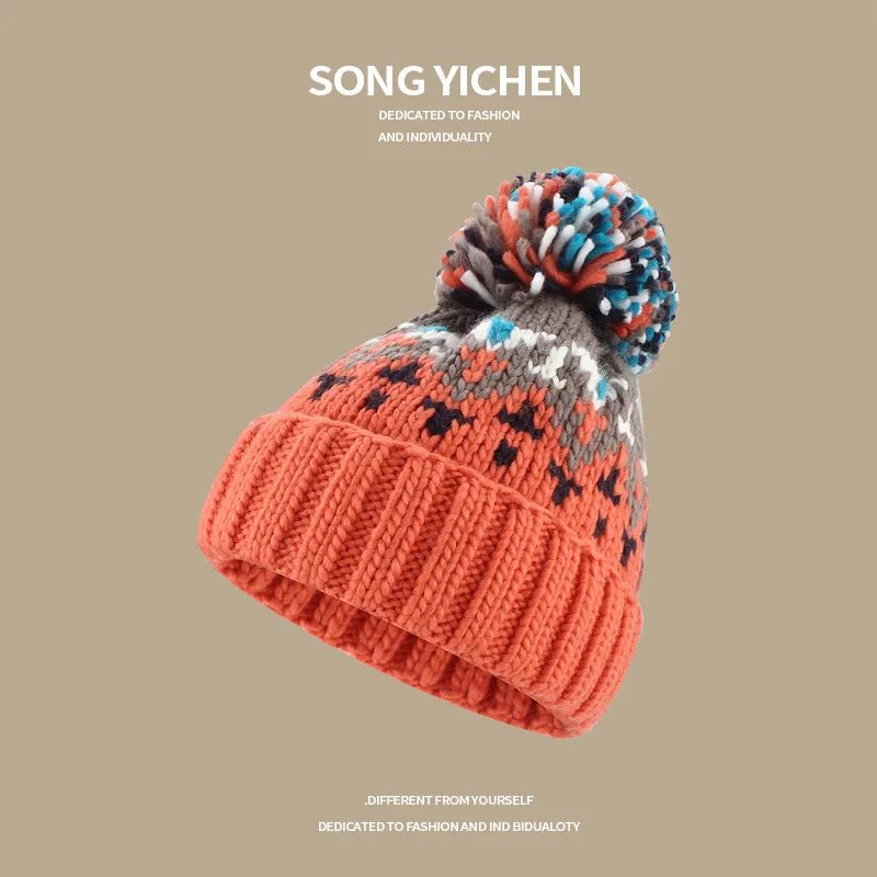 Warm Blue Knitted Hat Female  Fashion Brand Colorful Fur Ball Christmas Hat Autumn And Winter  Ear Protection Wool Hat display picture 6