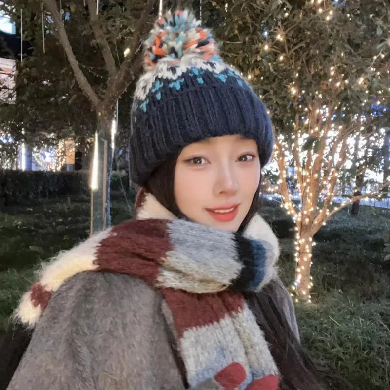 Warm Blue Knitted Hat Female  Fashion Brand Colorful Fur Ball Christmas Hat Autumn And Winter  Ear Protection Wool Hat display picture 11