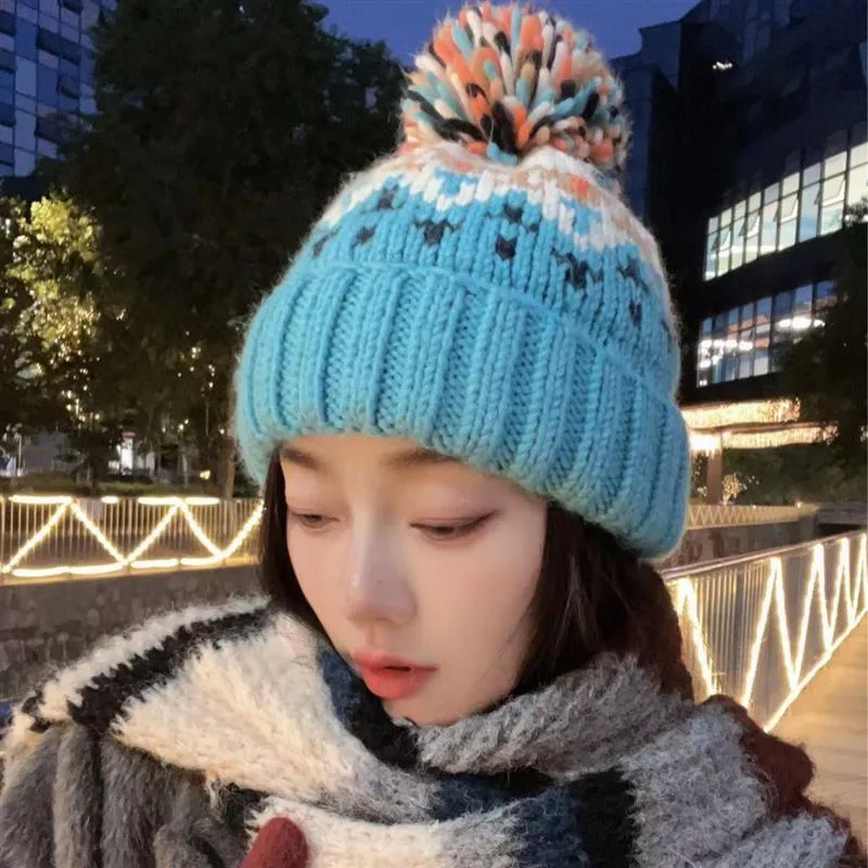 Warm Blue Knitted Hat Female  Fashion Brand Colorful Fur Ball Christmas Hat Autumn And Winter  Ear Protection Wool Hat display picture 14
