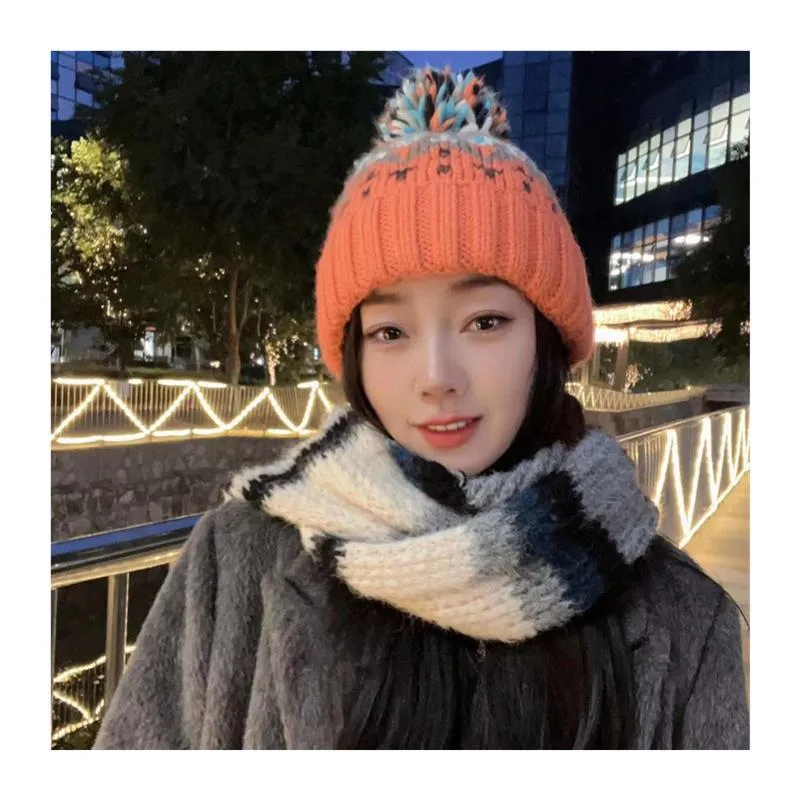 Warm Blue Knitted Hat Female  Fashion Brand Colorful Fur Ball Christmas Hat Autumn And Winter  Ear Protection Wool Hat display picture 15