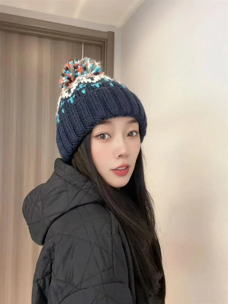 Warm Blue Knitted Hat Female  Fashion Brand Colorful Fur Ball Christmas Hat Autumn And Winter  Ear Protection Wool Hat display picture 16