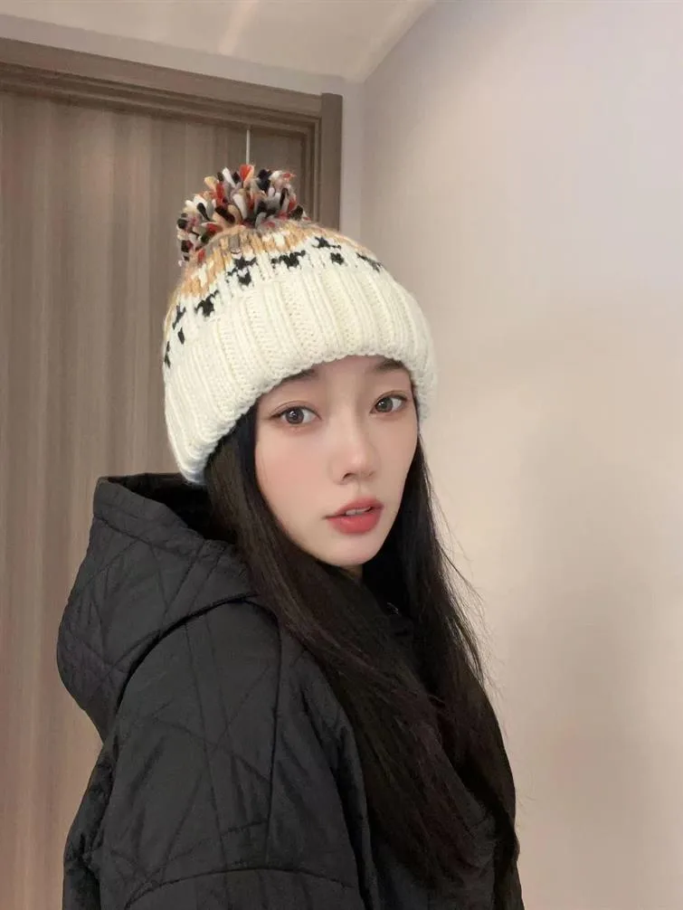 Warm Blue Knitted Hat Female  Fashion Brand Colorful Fur Ball Christmas Hat Autumn And Winter  Ear Protection Wool Hat display picture 20