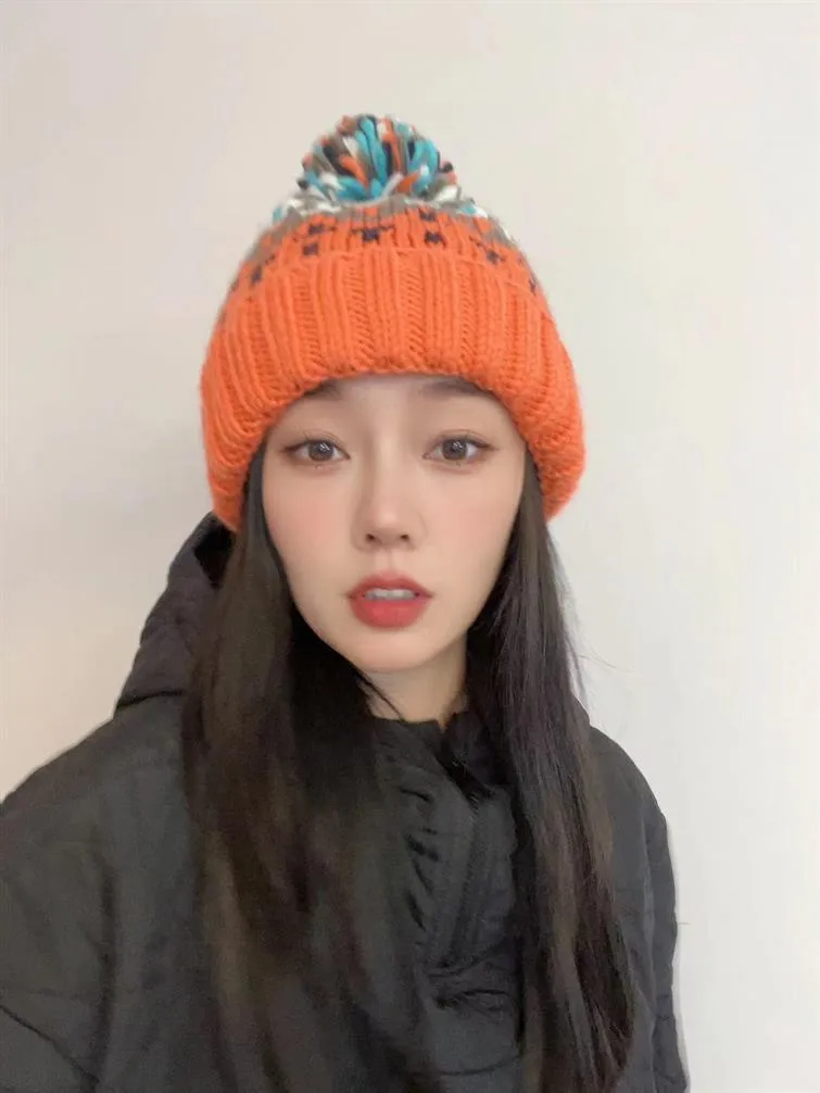 Warm Blue Knitted Hat Female  Fashion Brand Colorful Fur Ball Christmas Hat Autumn And Winter  Ear Protection Wool Hat display picture 23