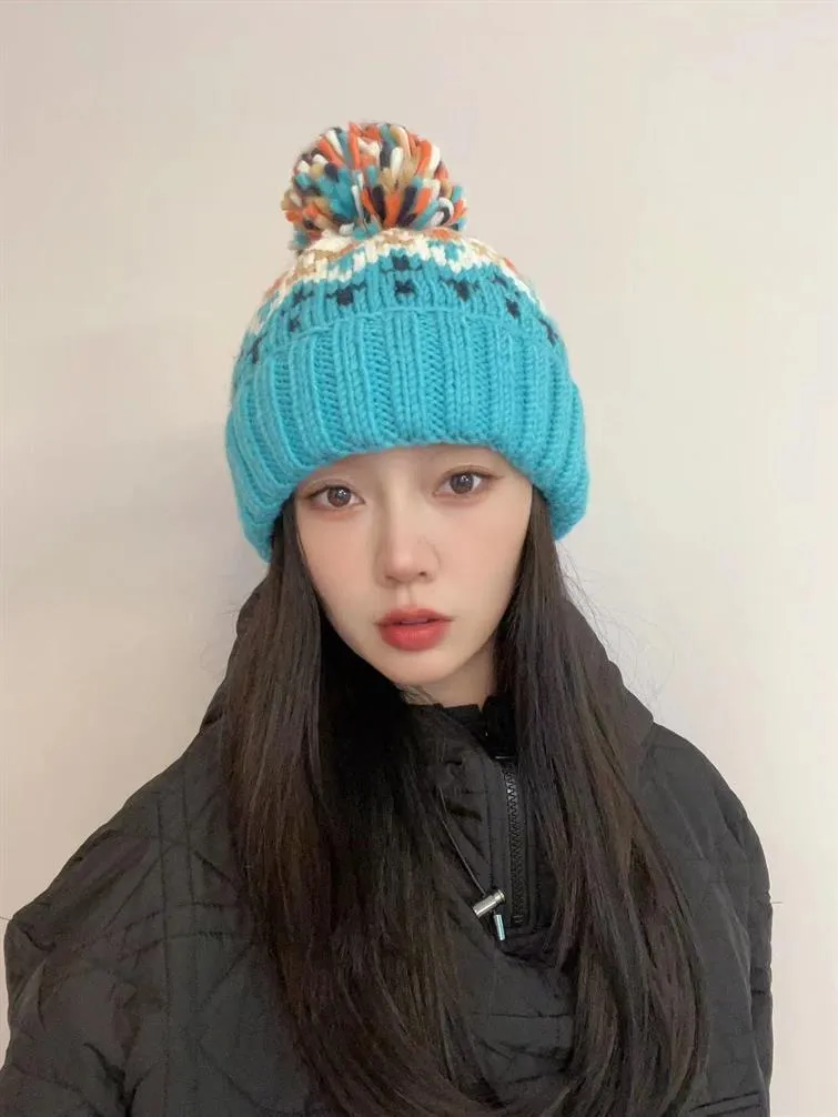 Warm Blue Knitted Hat Female  Fashion Brand Colorful Fur Ball Christmas Hat Autumn And Winter  Ear Protection Wool Hat display picture 26