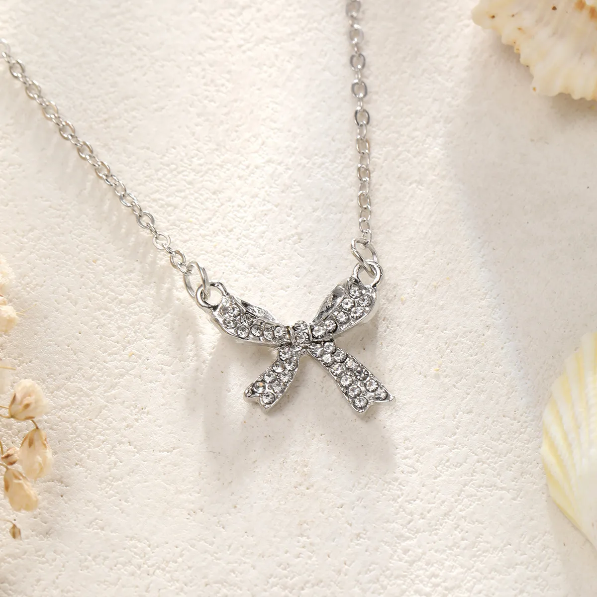 Simple Style Bow Knot Alloy Cable Chain Pendant Necklaces Wholesale display picture 6