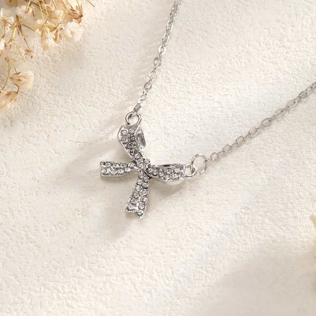 Simple Style Bow Knot Alloy Cable Chain Pendant Necklaces Wholesale display picture 5