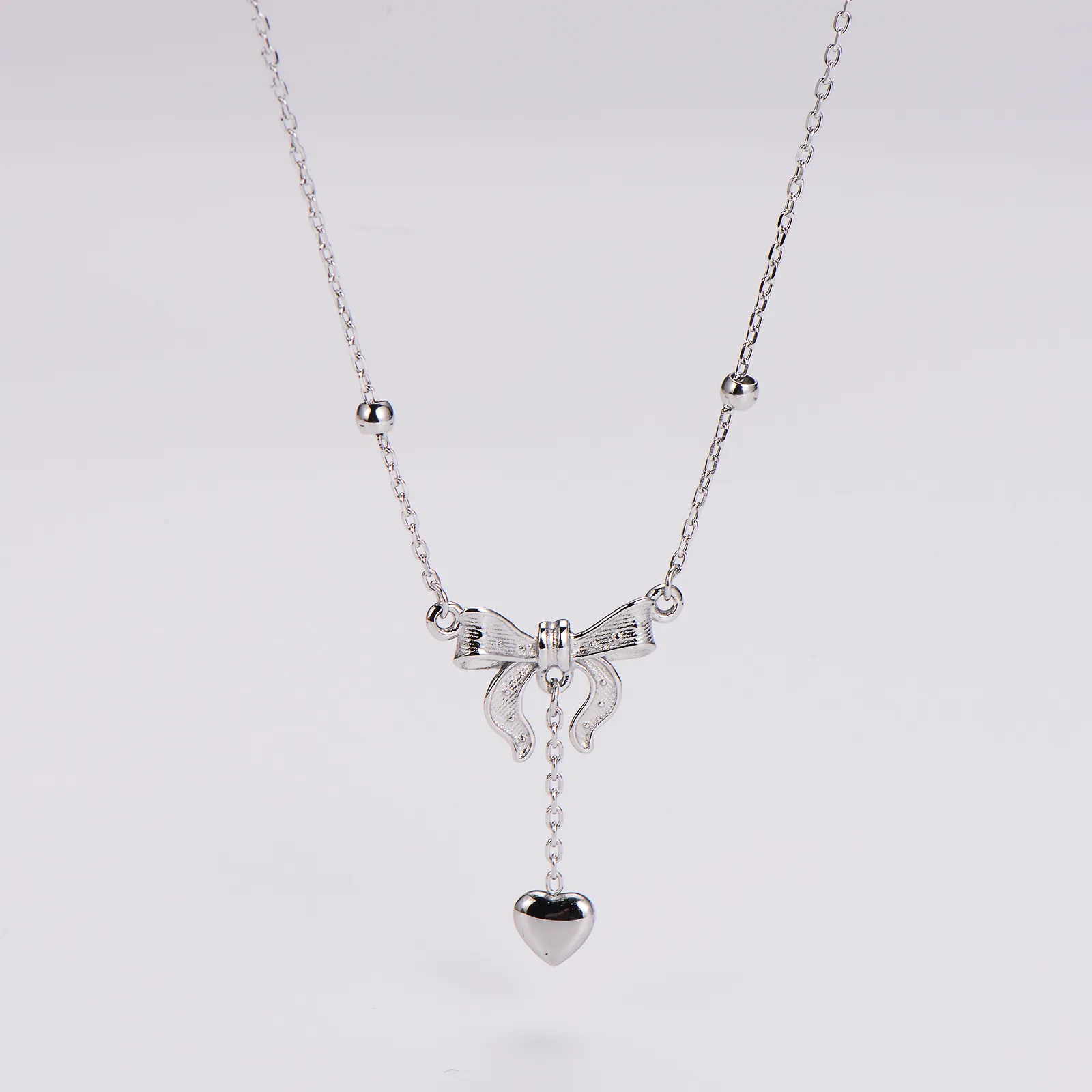 Wholesale Jewelry Queen Bridal Shiny Heart Shape Bow Knot 304 Stainless Steel Pendant Necklace display picture 4