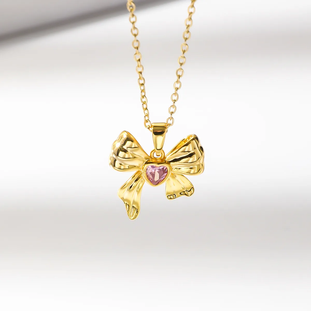 304 Stainless Steel 18K Gold Plated Cartoon Character Bow Knot Pendant Necklace display picture 1