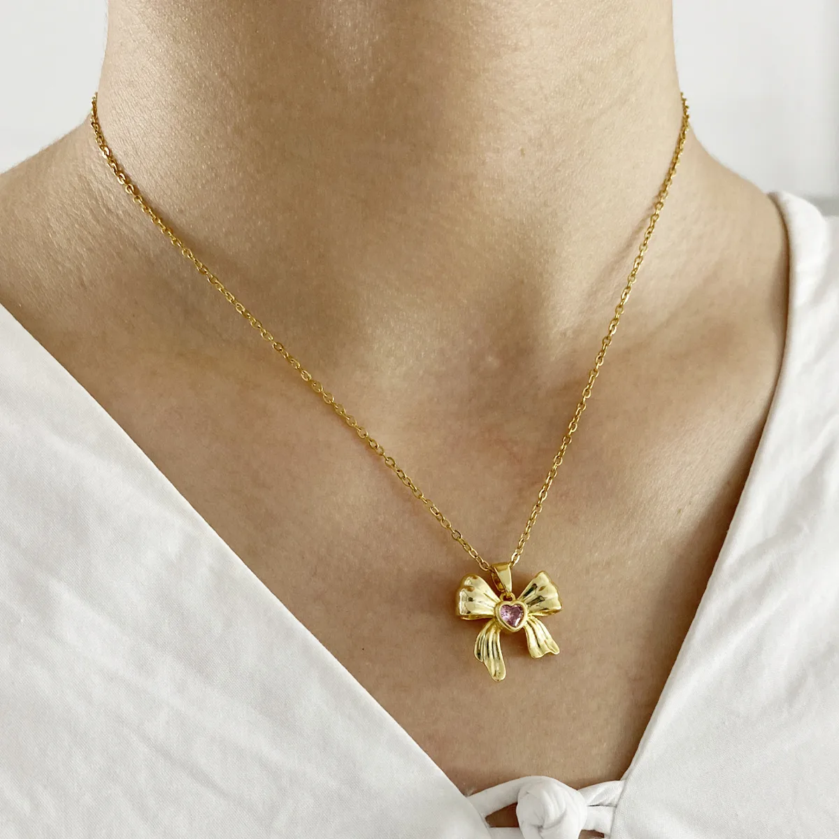 304 Stainless Steel 18K Gold Plated Cartoon Character Bow Knot Pendant Necklace display picture 7