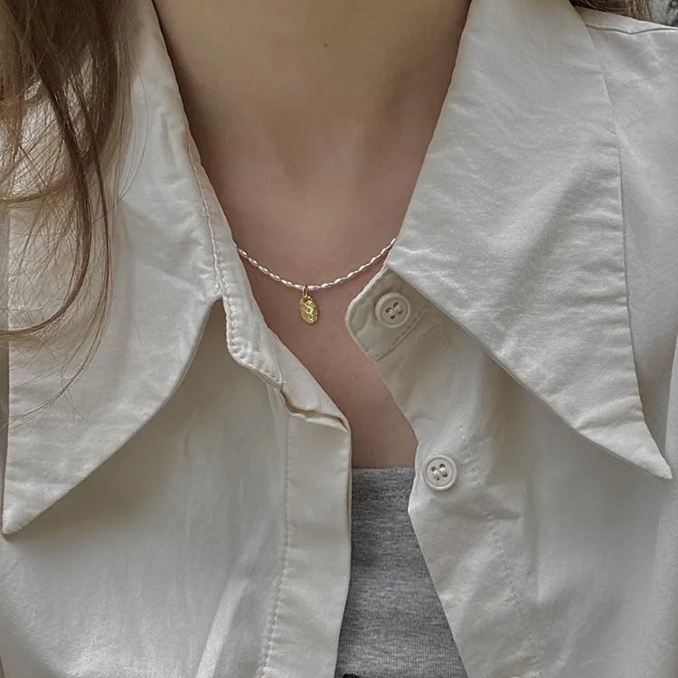 Gold And Silver Love Necklace Rice Olive Beads 925 Sterling Silver Niche Design Clavicle Chain Women's High-end Silver Ornaments display picture 2