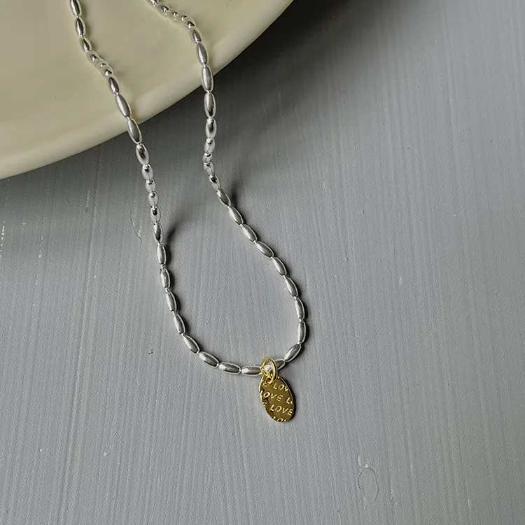 Gold And Silver Love Necklace Rice Olive Beads 925 Sterling Silver Niche Design Clavicle Chain Women's High-end Silver Ornaments display picture 6