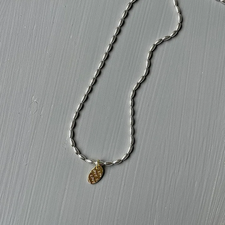 Gold And Silver Love Necklace Rice Olive Beads 925 Sterling Silver Niche Design Clavicle Chain Women's High-end Silver Ornaments display picture 7