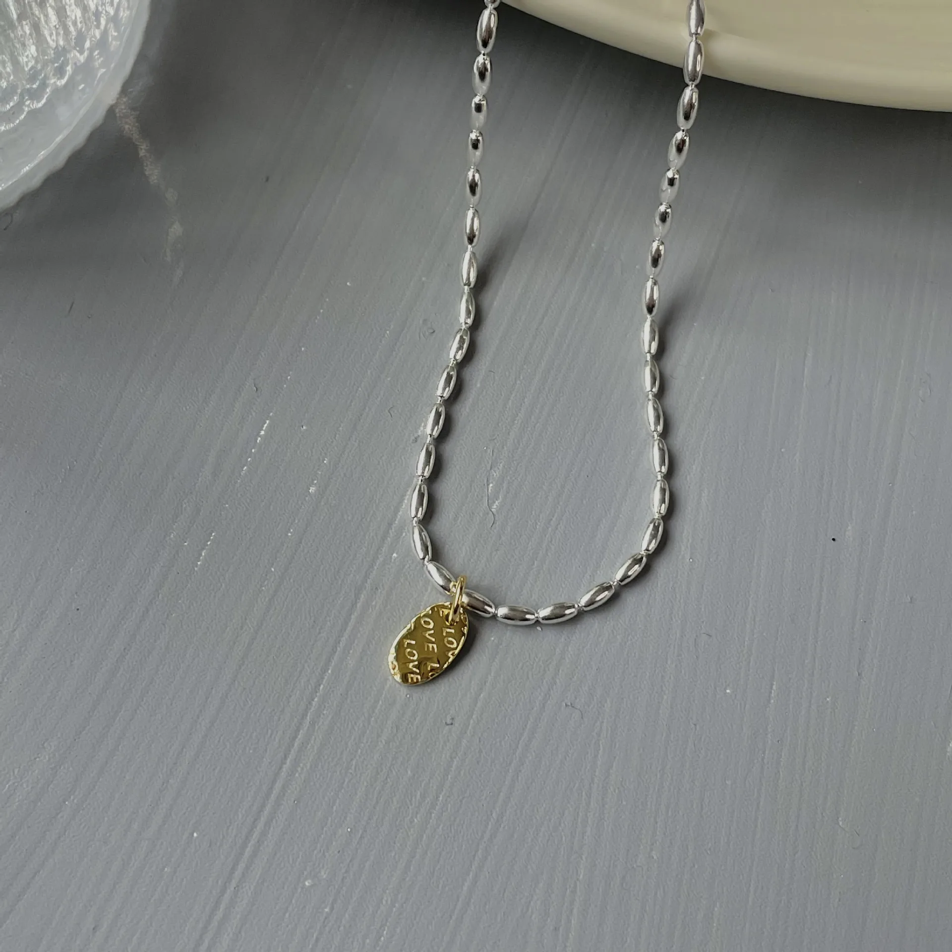 Gold And Silver Love Necklace Rice Olive Beads 925 Sterling Silver Niche Design Clavicle Chain Women's High-end Silver Ornaments display picture 14