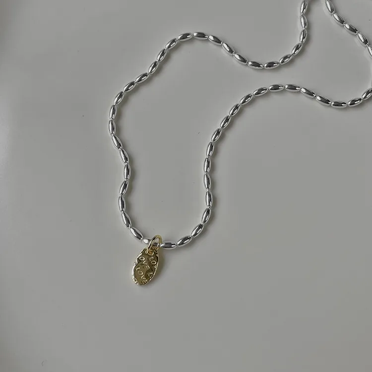 Gold And Silver Love Necklace Rice Olive Beads 925 Sterling Silver Niche Design Clavicle Chain Women's High-end Silver Ornaments display picture 15